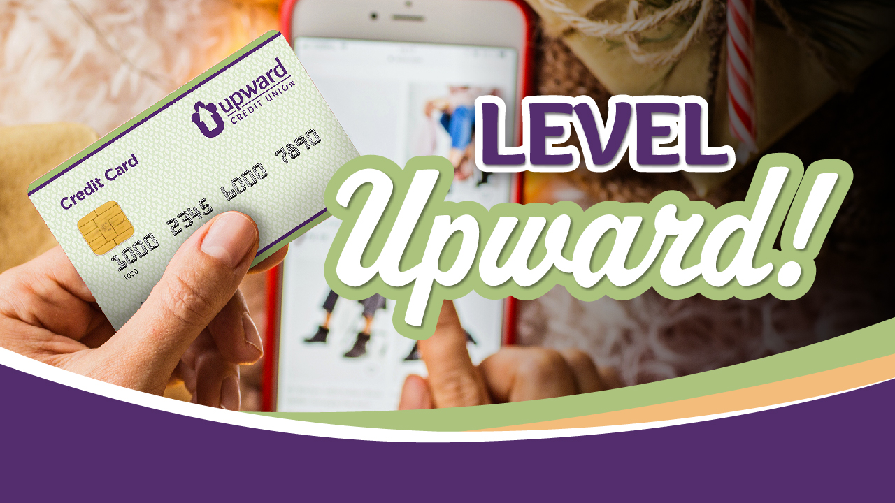 Person holding Upward Credit Union credit card and phone to pay online with headline "Level Upward"