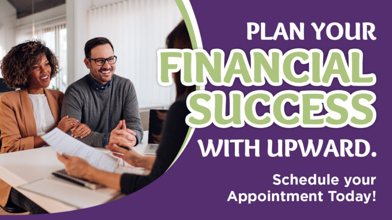 a smiling couple sitting across from a financial advisor in a modern office setting, reviewing documents.